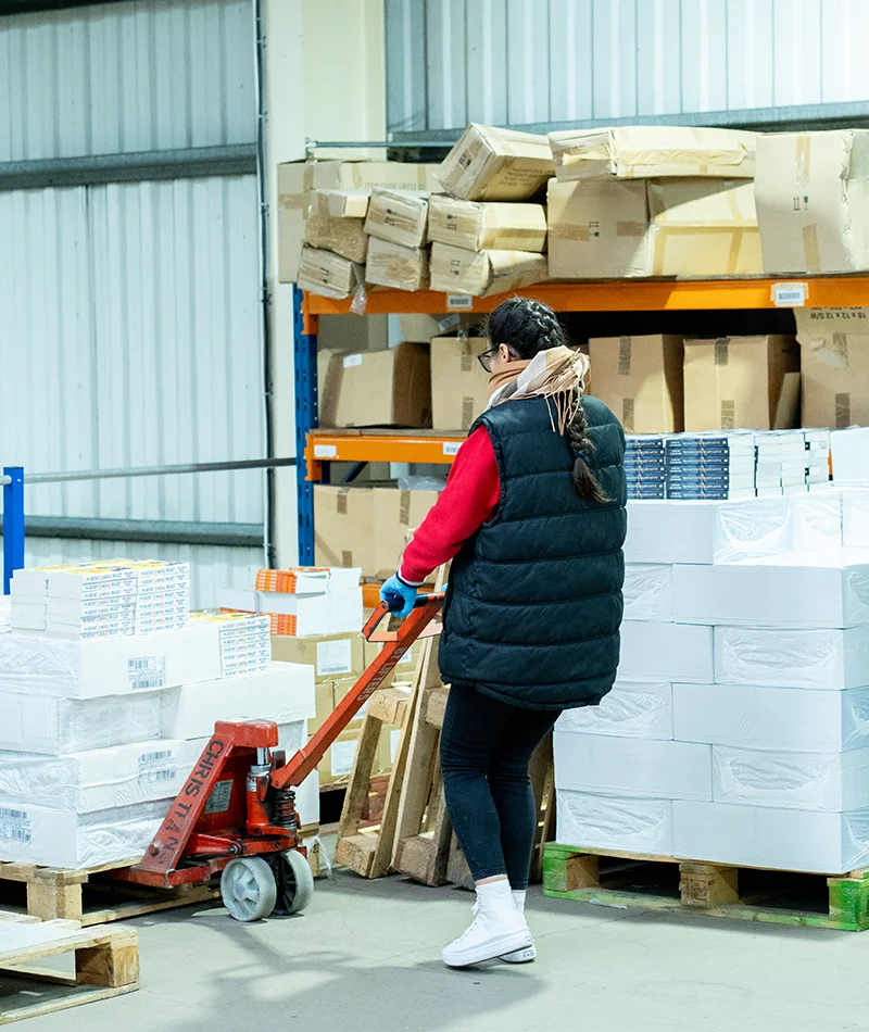 EC Group Pallet Truck being used in warehouse - large scale document fulfilment