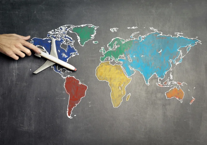 A map of the Earth on a blackboard, with each continent a unique colour