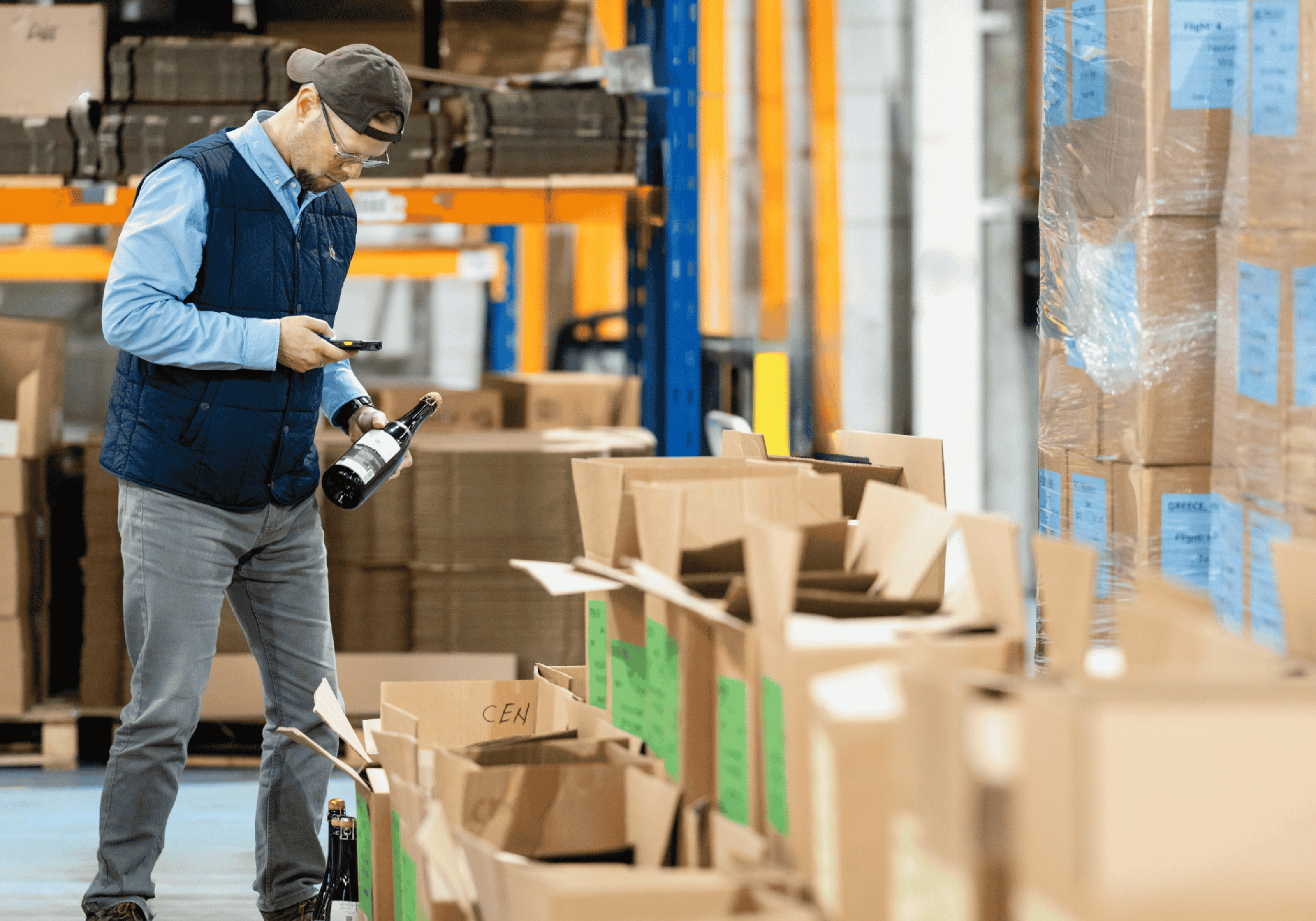 An EC Group employee helps Decanter's warehousing